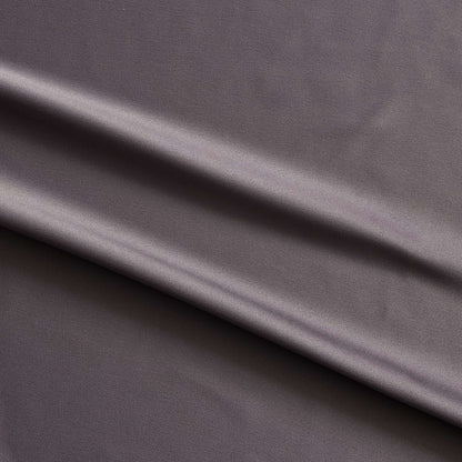 Trump showing the slate color version of a stretch duchess satin polyester and lycra blend with a delustered smooth sateen finish and gutsy weight