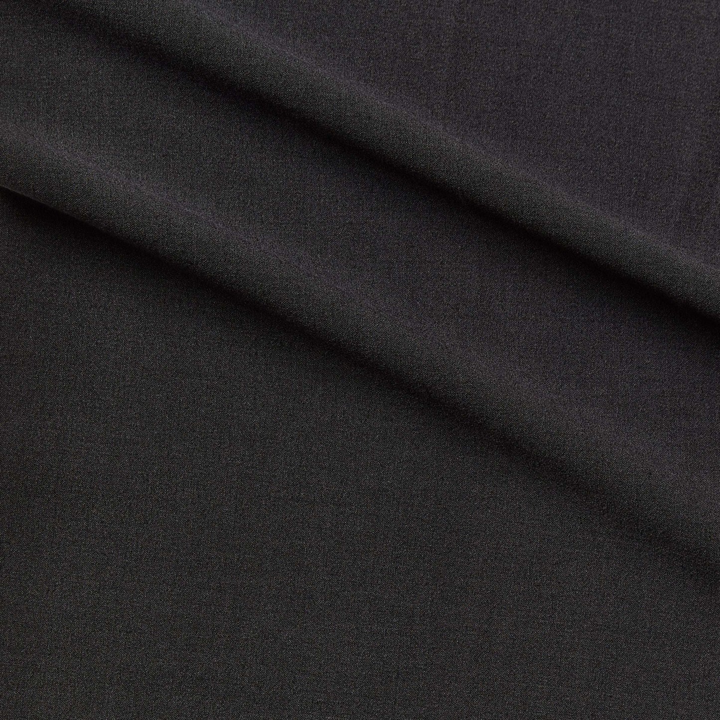 zara plain showing the charcoal color version of a two-way stretch soft polyester and rayon with added spandex