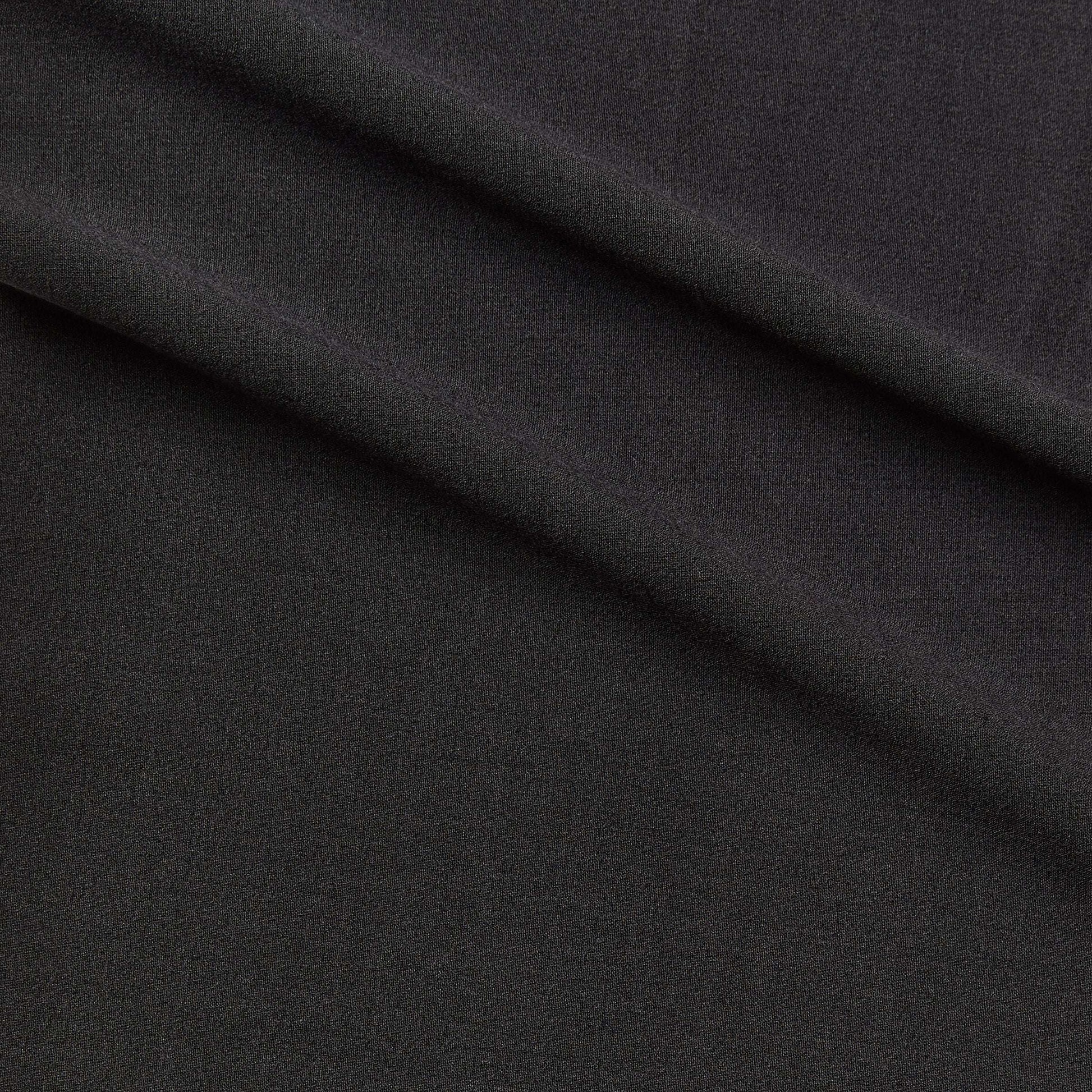 zara plain showing the charcoal color version of a two-way stretch soft polyester and rayon with added spandex