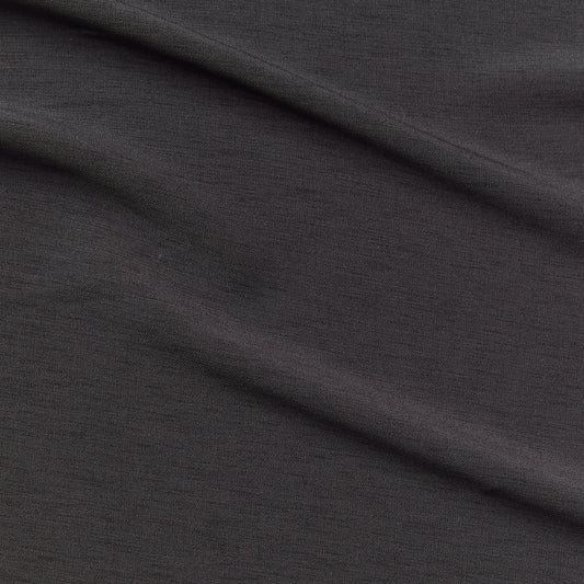 Ace exhibiting the  Charcoal color version of a stretch smooth polyester and spandex blend with great  drape