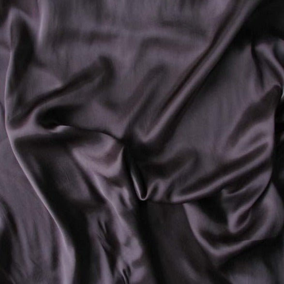 alberta presenting the charcoal colored version with silk like smooth breathable pure rayon fabric with fluid drape and a subtle sheen