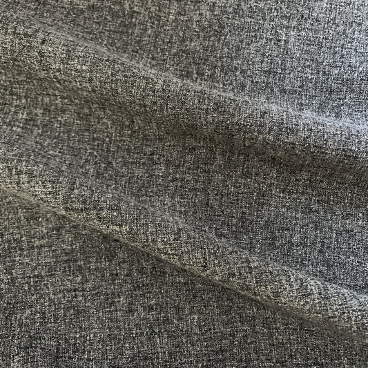 Bermuda showing the black and white shaded variant yarn dyed Tweed look Polyester and Viscose with Spandex 