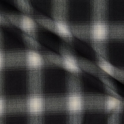 Displaying Blur which features black shaded colors on soft checks on a stretch polyester and rayon with spandex for stretch