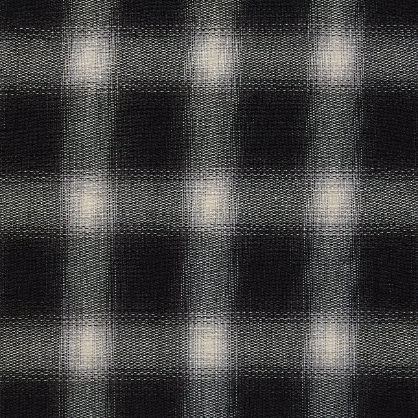 Displaying Blur which features black shaded colors on soft checks on a stretch polyester and rayon with spandex for stretch