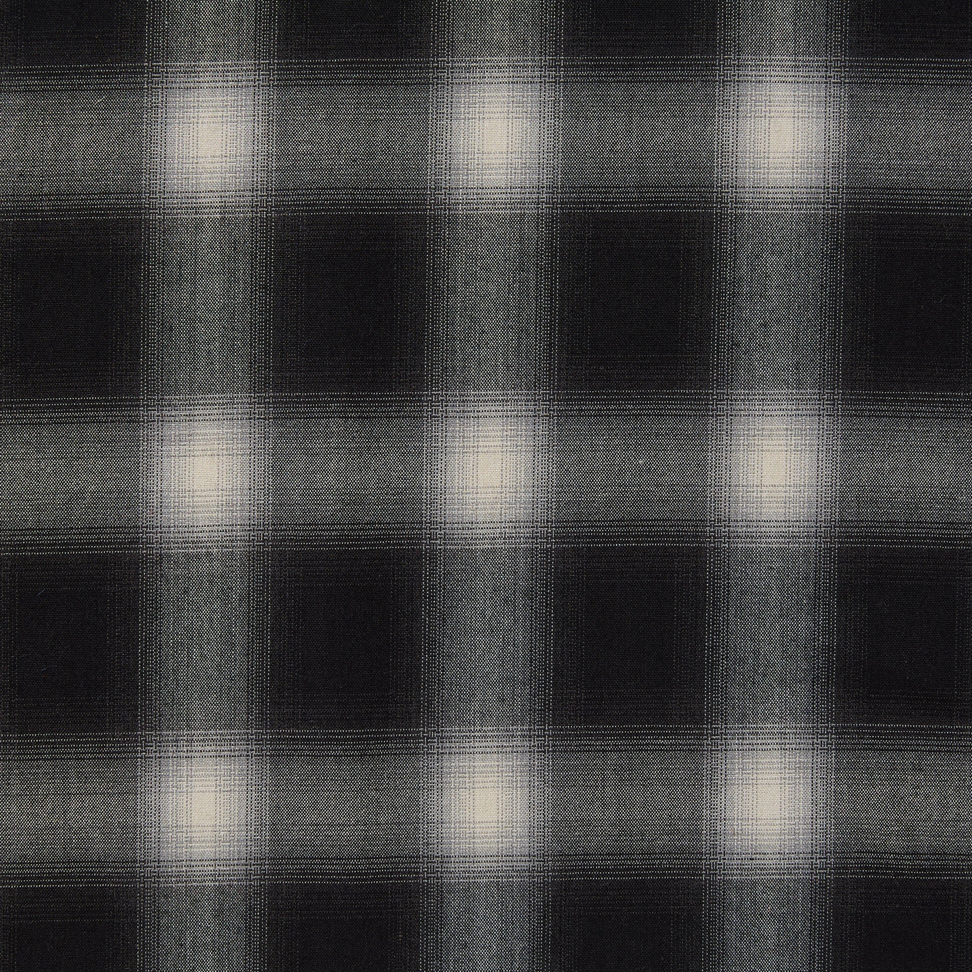 Displaying Blur which features black shaded colors on soft checks on a stretch polyester and rayon with spandex for stretch