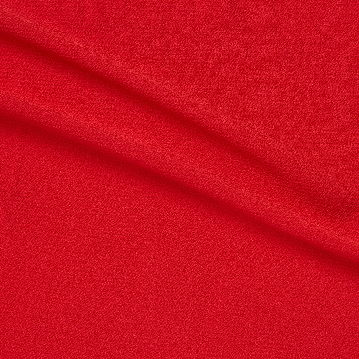 bubble displaying the chilli color version featuring soft light weight stretch crepe-weave polyester with spandex featuring great drape