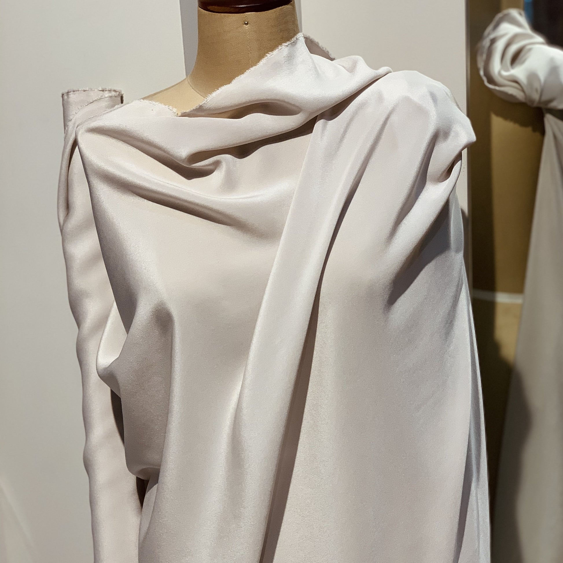 Crepe De Chine exhibiting the draped vintage color version of a Pure mulberry silk with fluid drape and a matte face