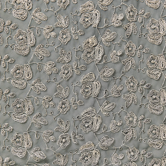 claudia showing an ivory color version of a rayon Floral Roses design embroidered on a black nylon mesh