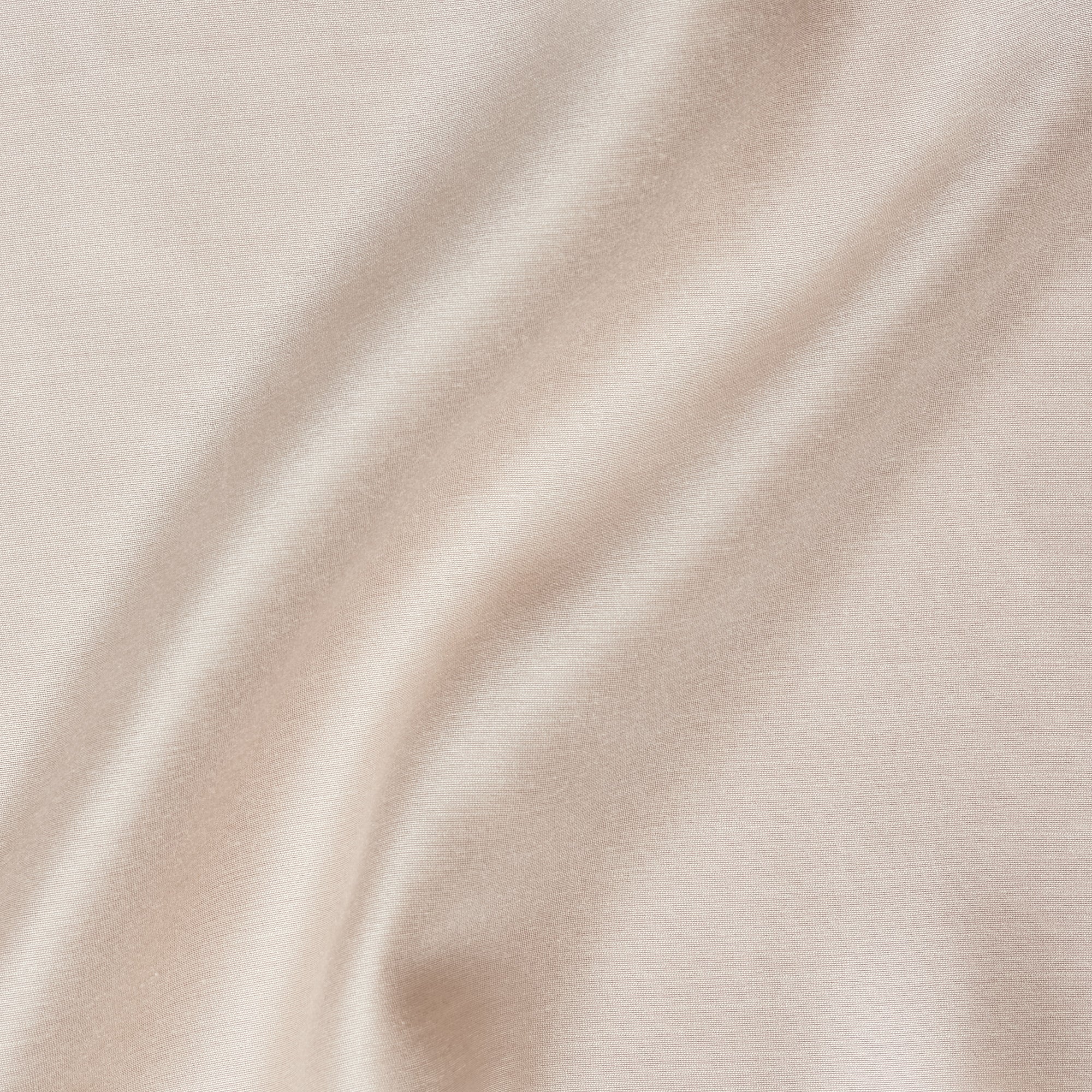 Corisia illustrating the Oyster color version of a soft silk viscose and cotton blend with natural silk sheen medium softness and moderate drape