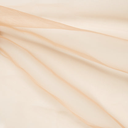 crinoline showing the nude color version of a pure polyester stiff fine netting with subtle sheen