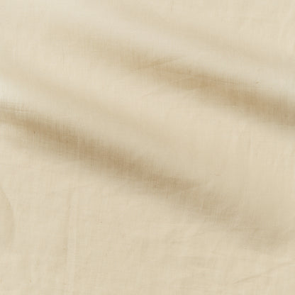 cruise displaying the biscuit color version of a lightweight linen and polyester blend with subtle sheen and moisture wicking properties