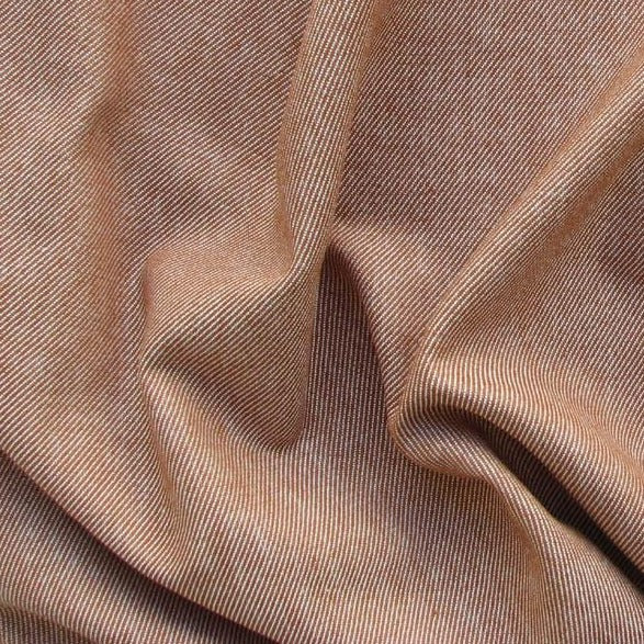 Cotton Twill displaying the rust color version of a heavy weight yarn dyed pure cotton fabric