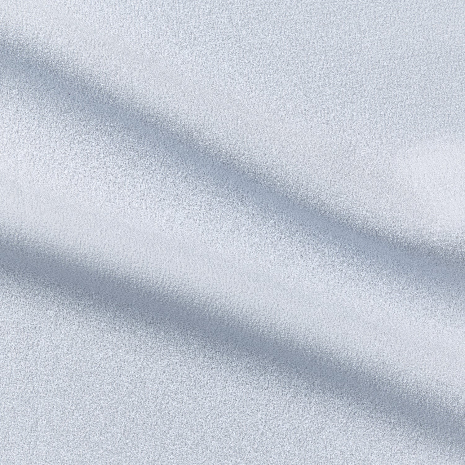 dublin showing the ice blue color version of a stretch heavy weight textured crepe polyester with spandex for two-way stretch