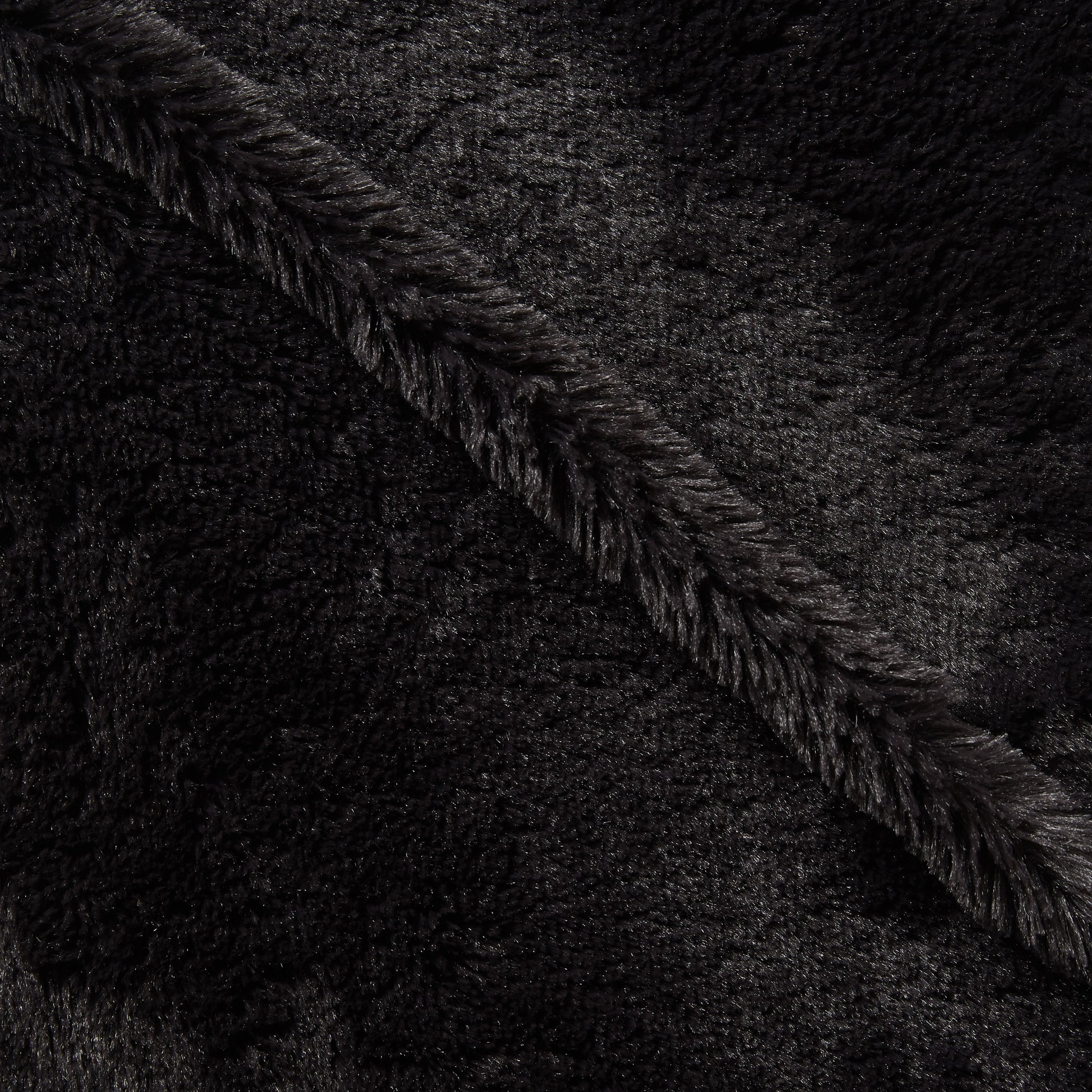 Elise Plain displaying the charcoal color version pure polyester Soft faux fur