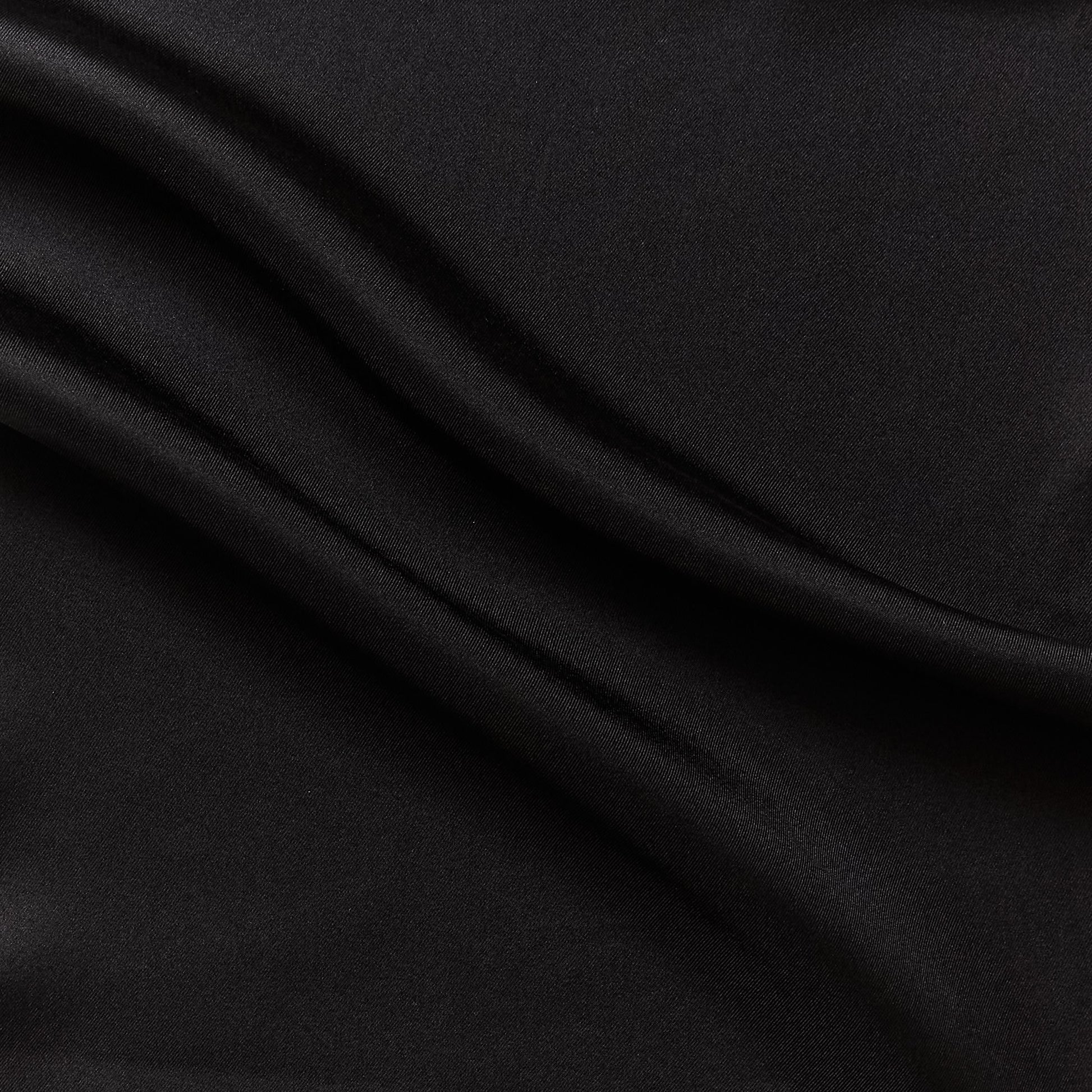 Eternity displaying the black color version of a heavy weight pure mulberry silk satin with fluid drape