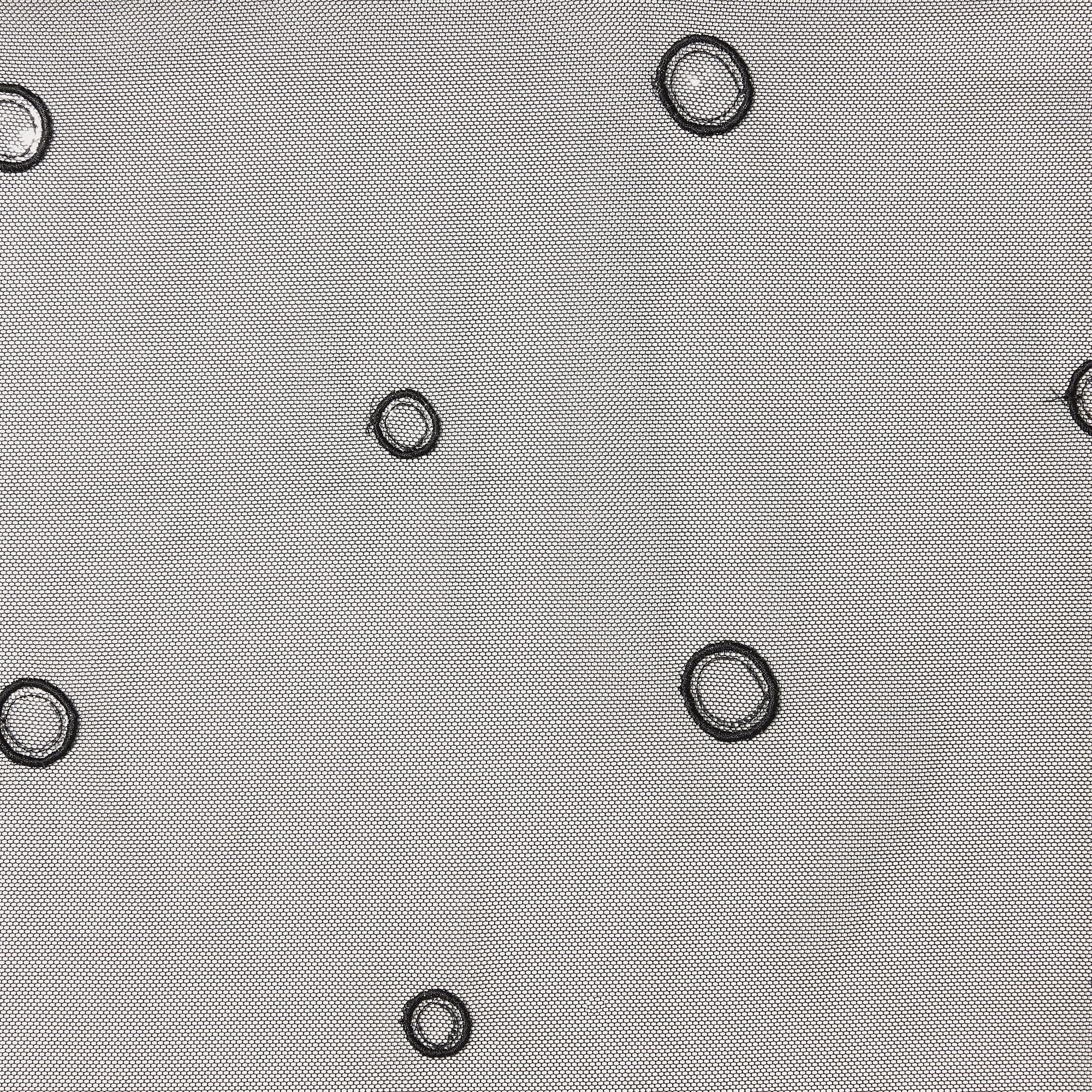 evolve displaying black embroidered circles and spots on black mesh nylon rayon blend
