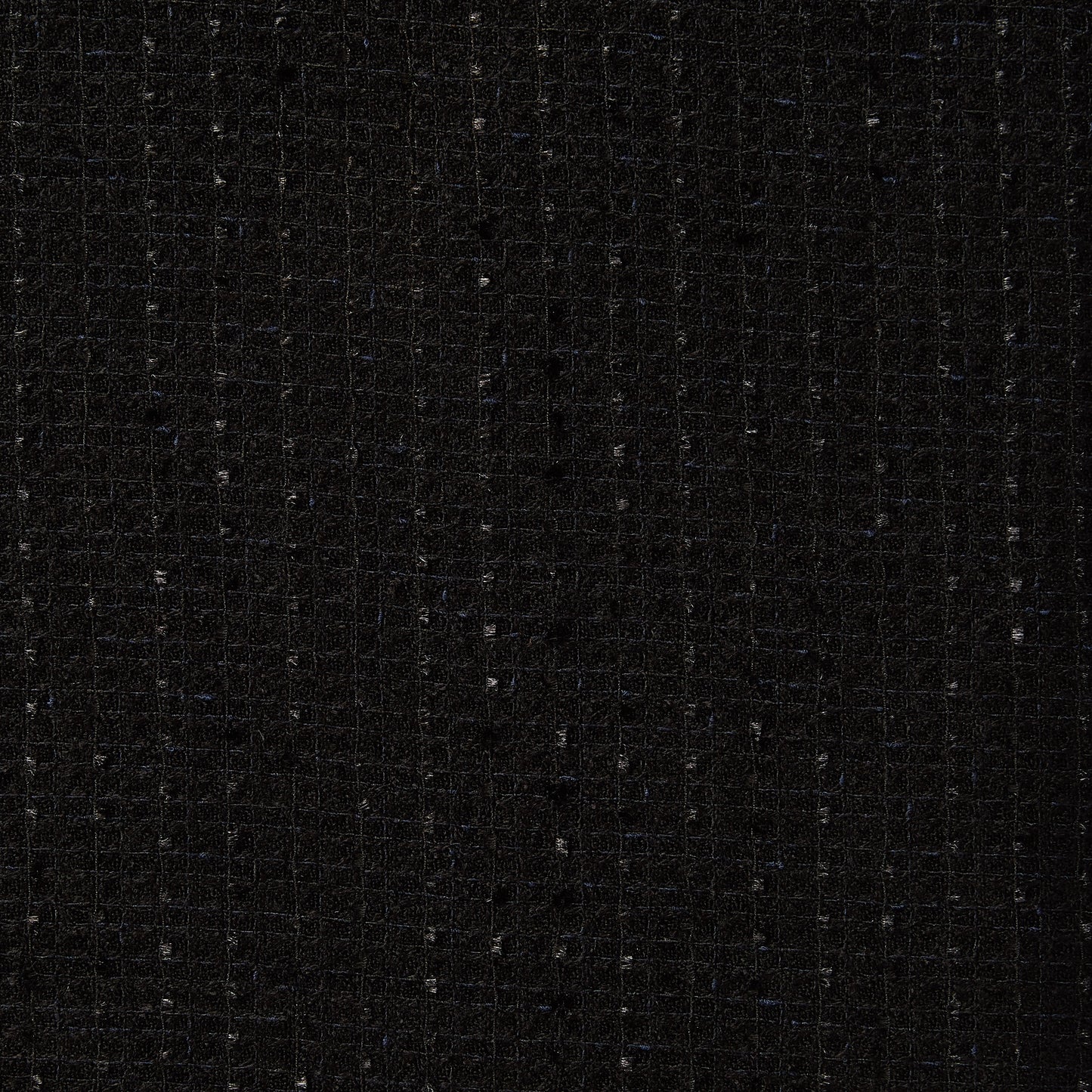 Eyelash displaying the black color woven yarn dyed tweed Acrylic  blend for suiting