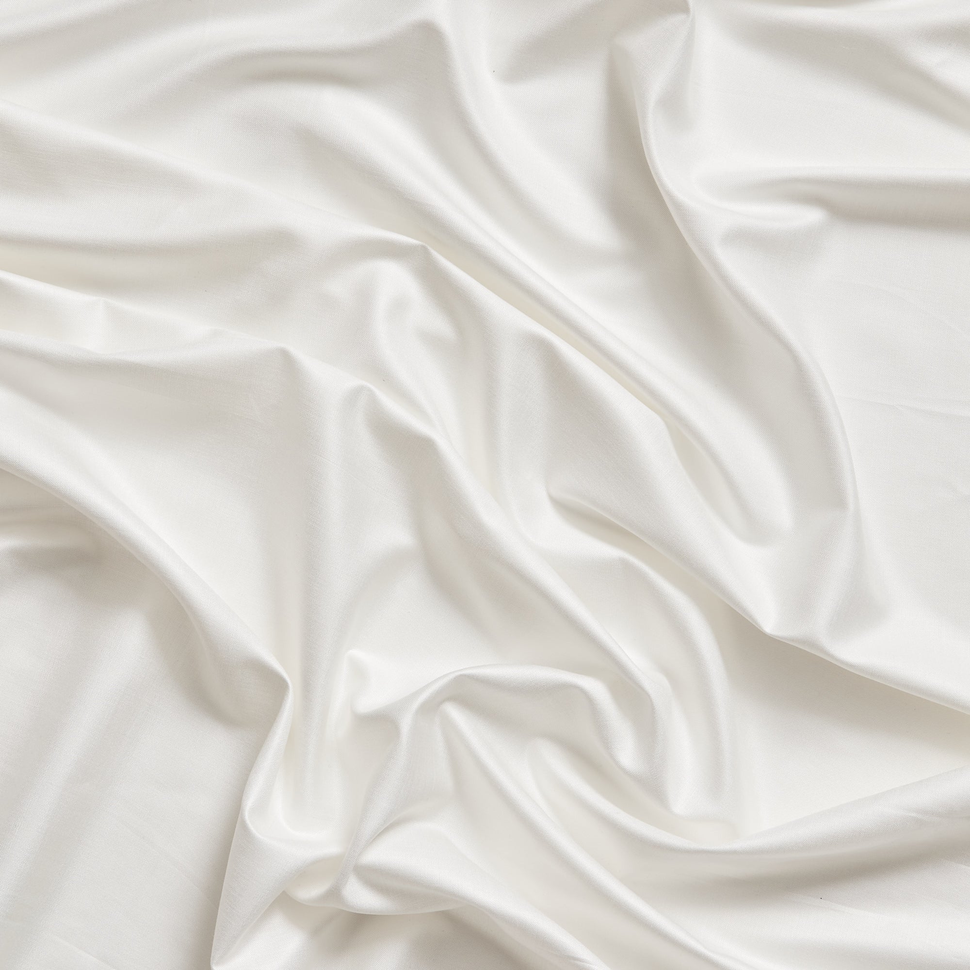 Flex displaying the white color version with a smooth wet leather look stretch viscose blended with spandex and featuring excellent drape