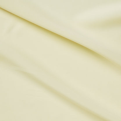 fortune displaying the rice color version with smooth stretch polyester blended and spandex featuring fluid drape