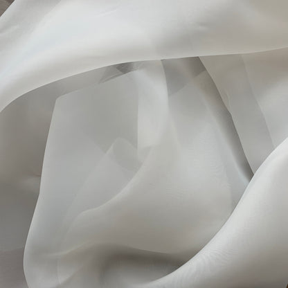 Displaying Gazar Satin Organza a ivory colored lustrous poly organza with a soft hand-feel