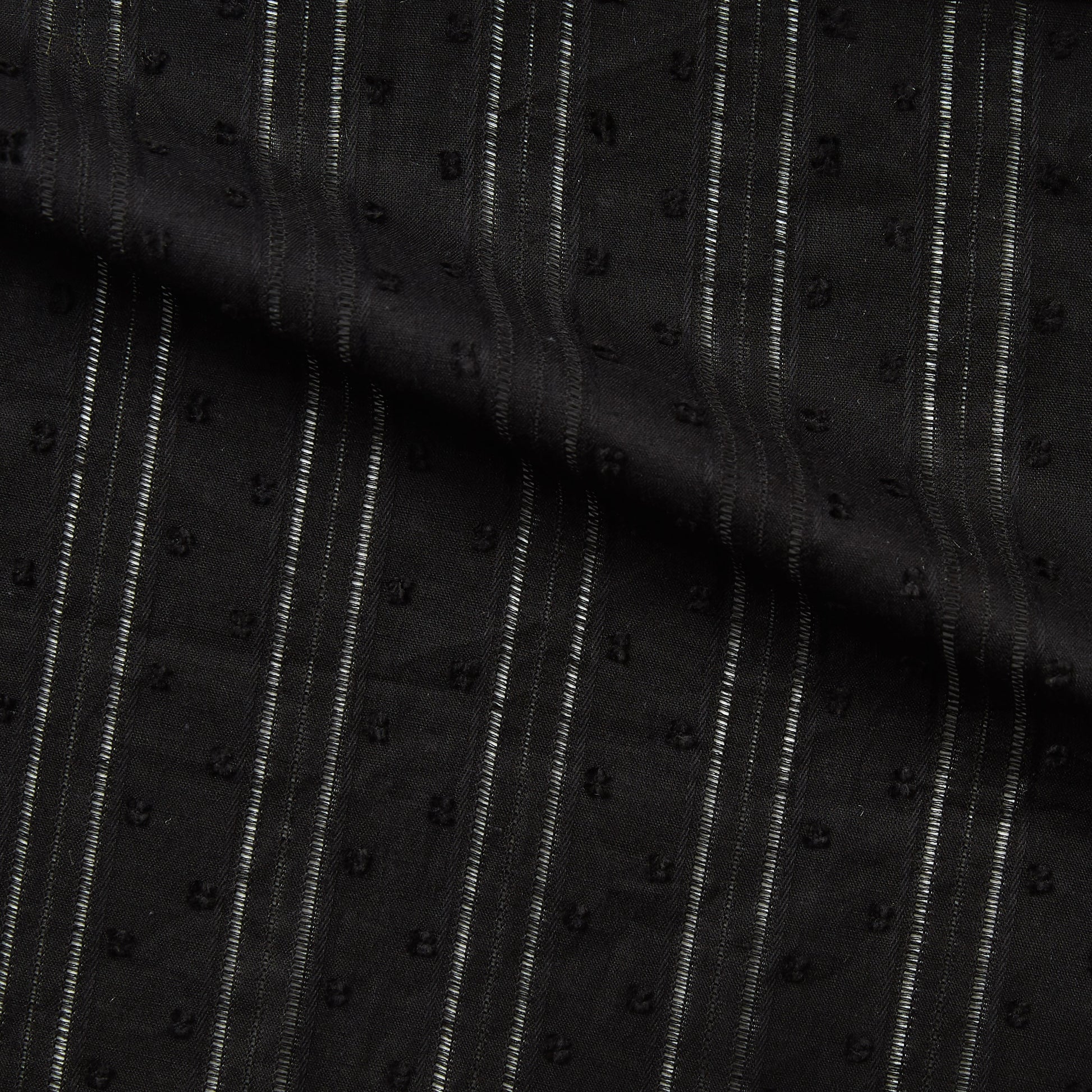 Displaying Hailspot a Black colored base of a breathable soft pure cotton voile with elegant drop stitch stripes and tuft spot textured face