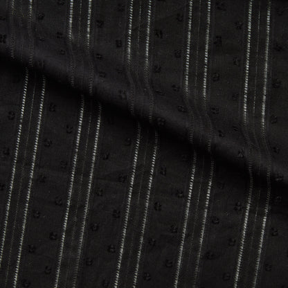 Displaying Hailspot a Black colored base of a breathable soft pure cotton voile with elegant drop stitch stripes and tuft spot textured face