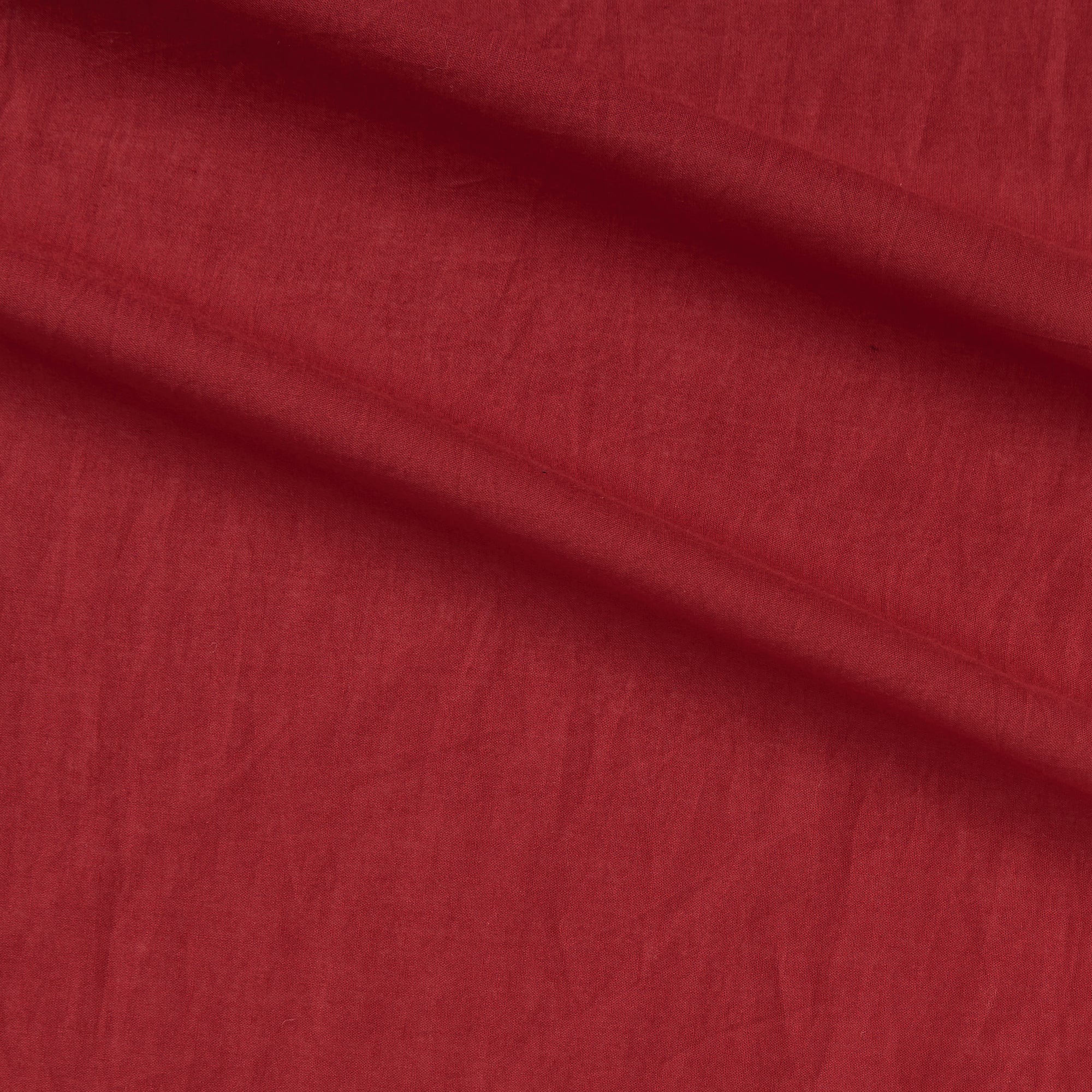 Haitana displaying the Red color version of a Fine light weight breathable soft smooth pure cotton voile