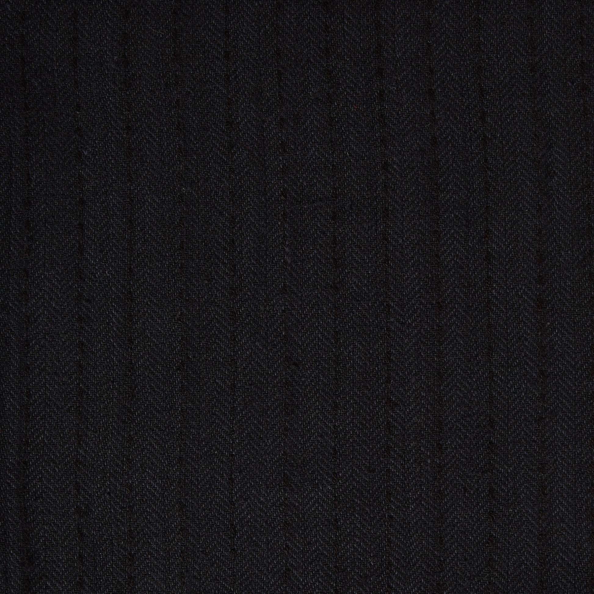 Displaying herringbone a black colored classic patterned all natural viscose and wool blend