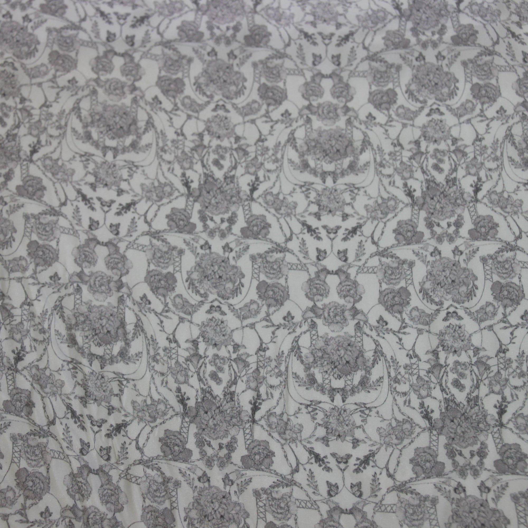 Displaying Filigree a gray toned floral print on pure silk