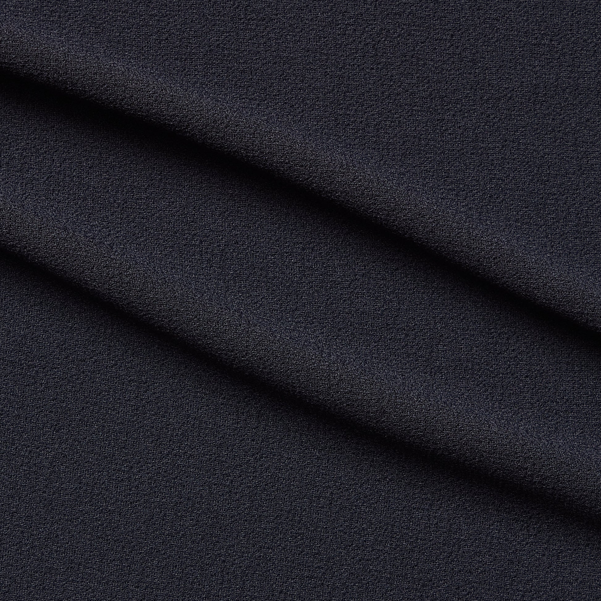 London Crepe presenting the charcoal color version with 2 way stretch knit polyester with spandex