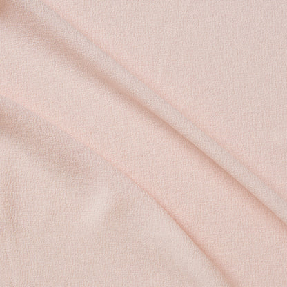 London Crepe presenting the pink color version with 2 way stretch knit polyester with spandex