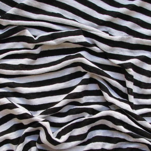 linen knit presenting a black and white striped version of a pure lightweight linen with fluid drape