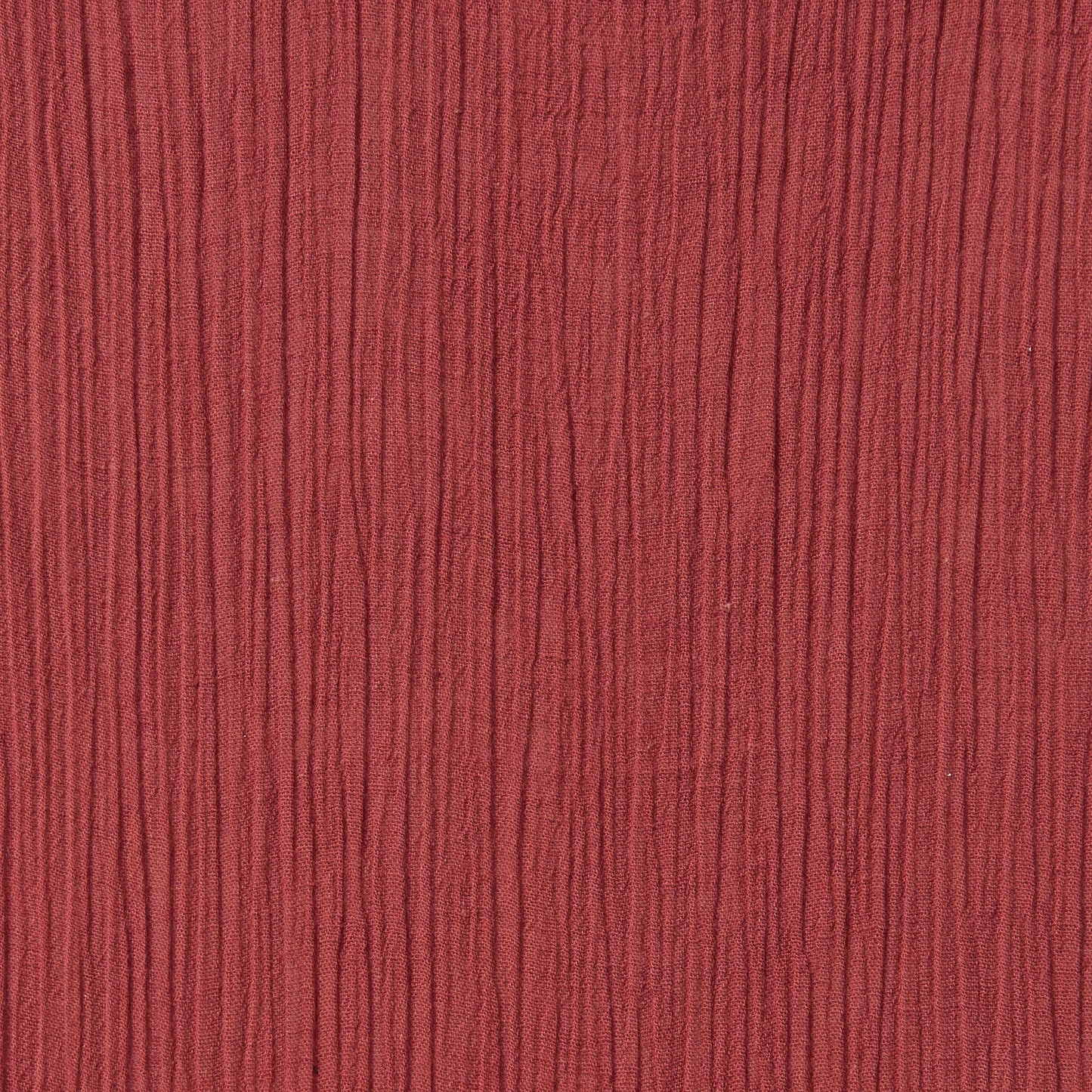 muslin displaying the garnet color version of a pure  breathable soft and natural  cotton muslin with yoryu crinkle textured face