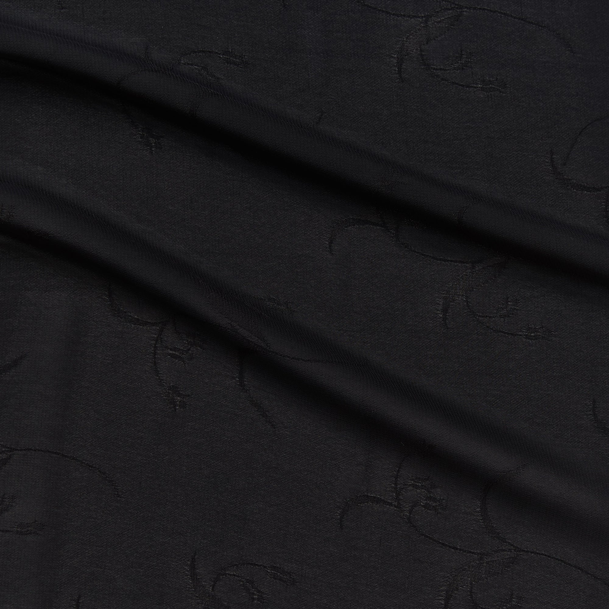 myth displaying the black color version of a light weight floral jacquard pure rayon georgette with good drape