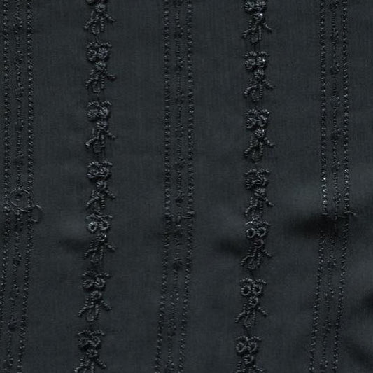 Featuring mellow a black colored pure polyester light weight crinkle georgette with lined embroidery 