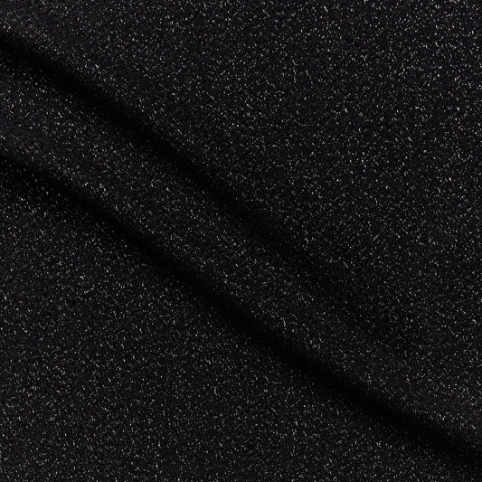 phoenix demonstrating the black color version of a textured tweed look yard dyed heavy weight pure silk with lurex highlights 