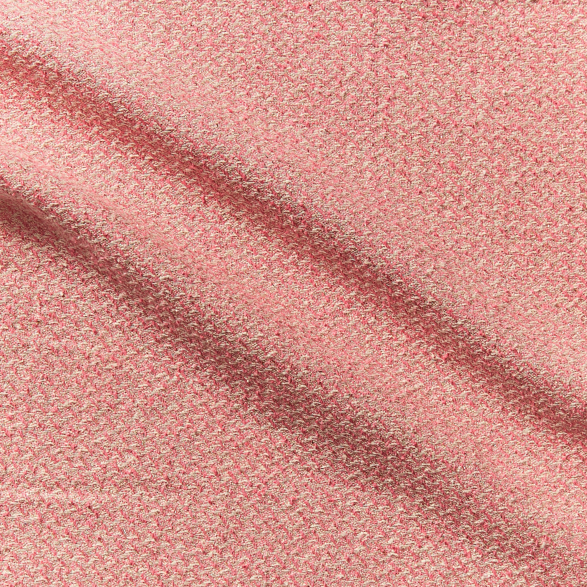 phoenix displaying the coral color version of a textured tweed look yard dyed heavy weight pure silk with lurex highlights 
