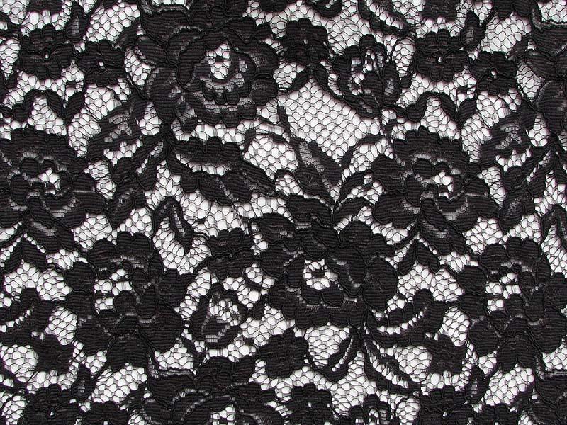 Displaying astoria a black colored fabric  with Rochelle lace with rose design scalloped edge with eyelash trim nylon and rayon blend closeup of details