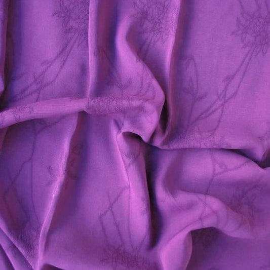 Replay featuring the plum color version of a soft pure Rayon Georgette with subtle floral pattern Jacquard and good drape
