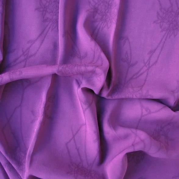 Replay displaying the plum color version of a soft pure Rayon Georgette with subtle floral pattern Jacquard and good drape