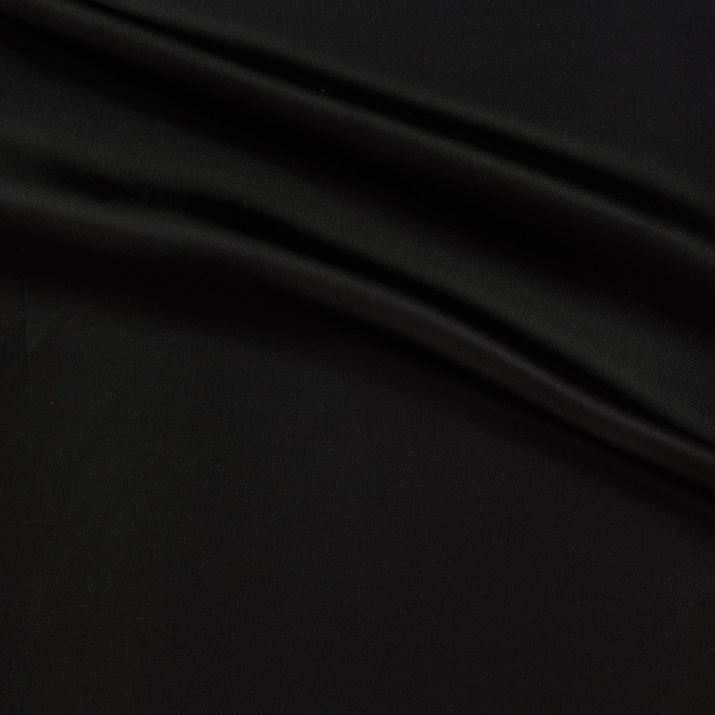 saga presenting the black color version of a pure rayon Fine twill satin with fluid drape