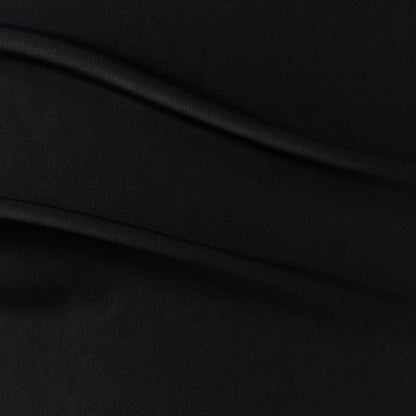 sakura presenting the black color version of a satin bamboo and viscose blend with both satin and matte faces featuring fluid drape