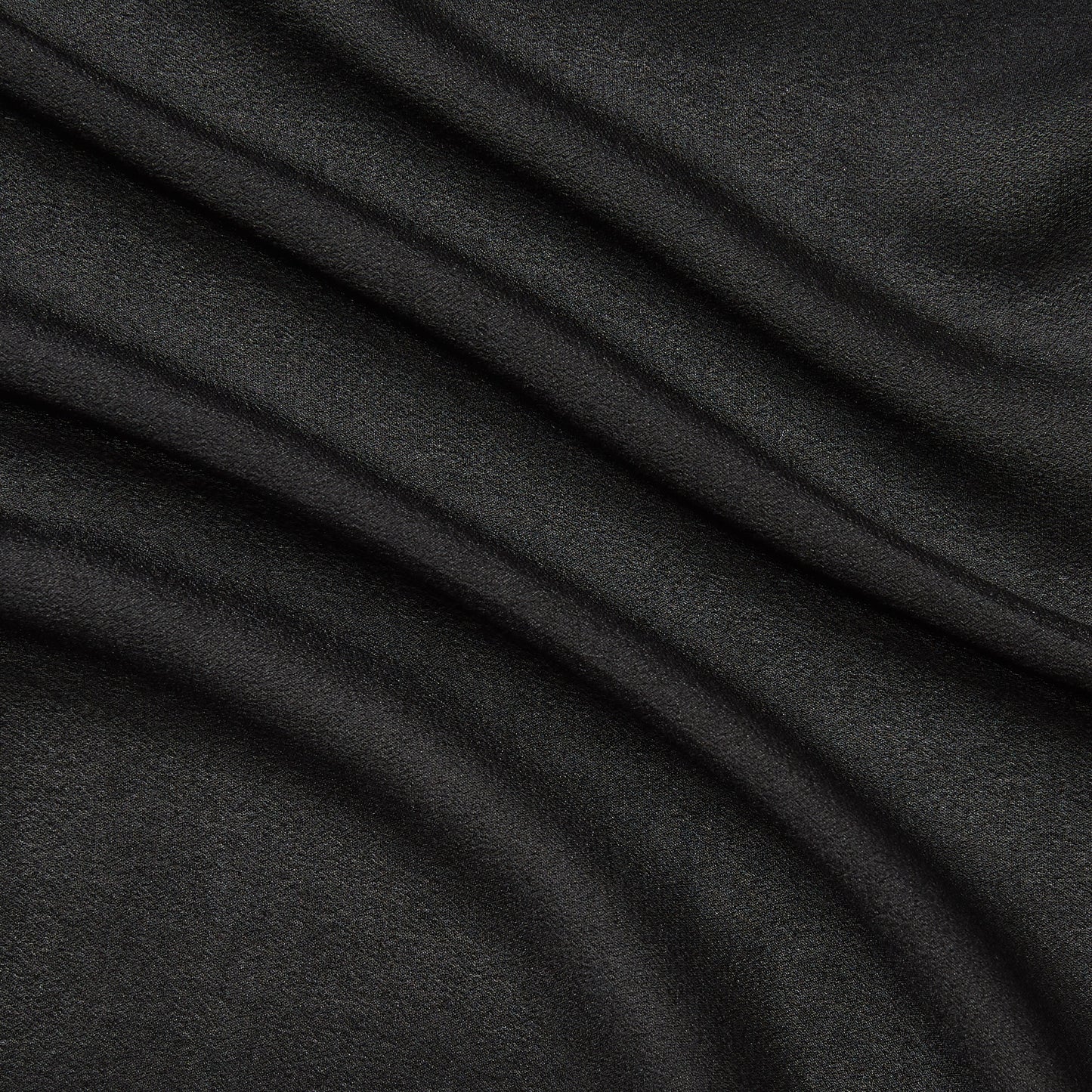 Featuring shimmer a black colored fabric with metallic glitter print on Semi-sheer, soft pure silk georgette featuring good drape