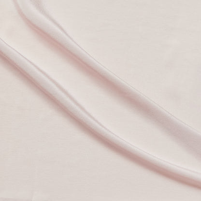 Crepe De Chine exhibiting the vintage color version of a Pure mulberry silk with fluid drape and a matte face and cool handle
