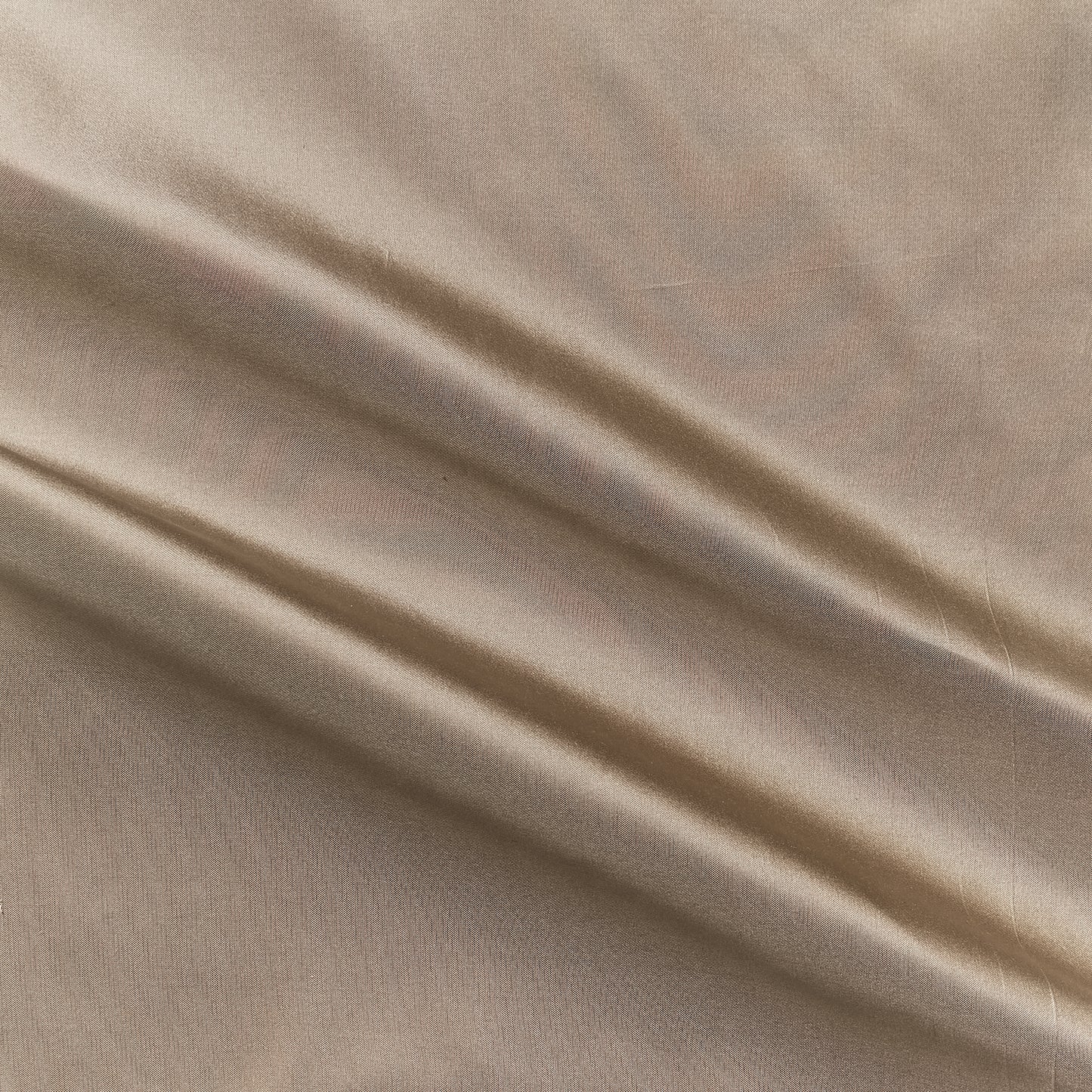 silk taffeta showing the mocha color version of a smooth crisp pure silk with good drape