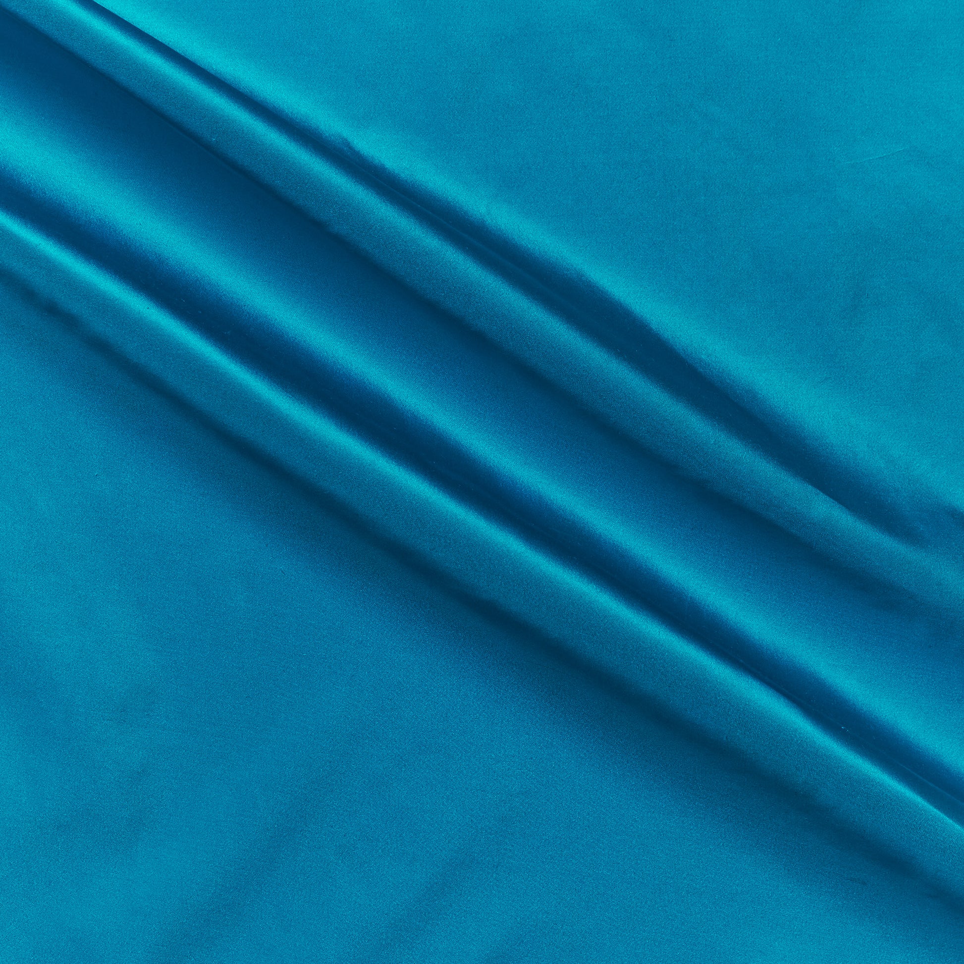 silk taffeta showing the new electric color version of a smooth crisp pure silk with good drape