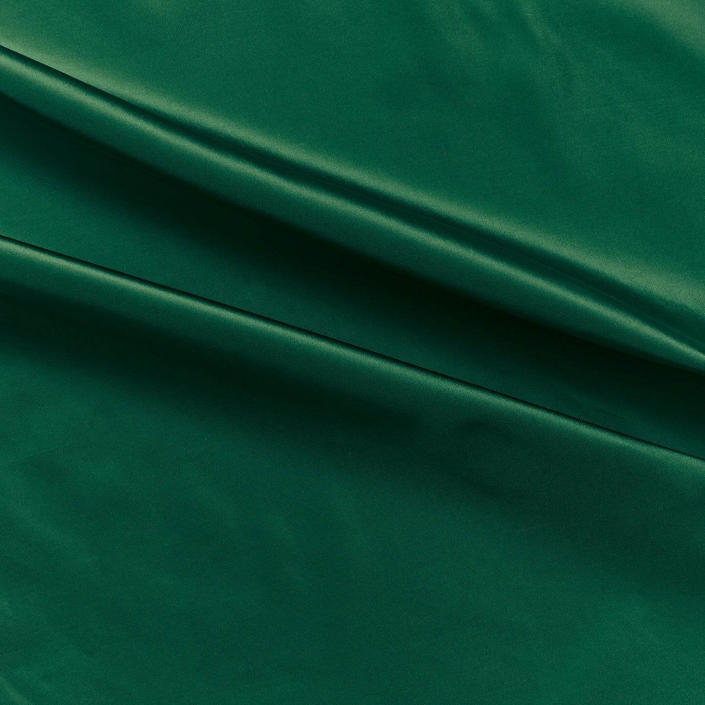 silk taffeta showing the petrol color version of a smooth crisp pure silk with good drape