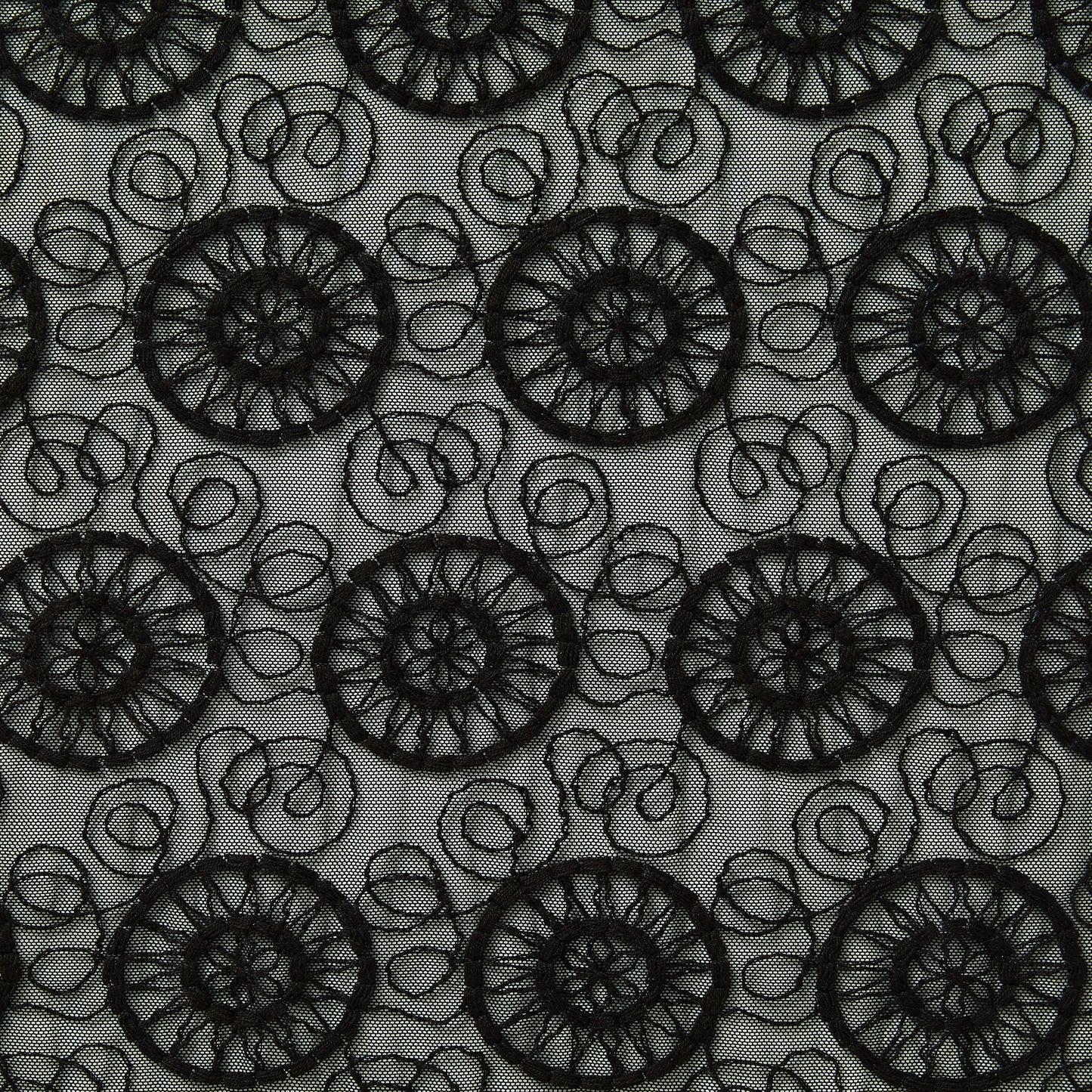 Displaying Solaris a Black colored nylon and rayon Abstract solar embroidery design on sheer mesh base