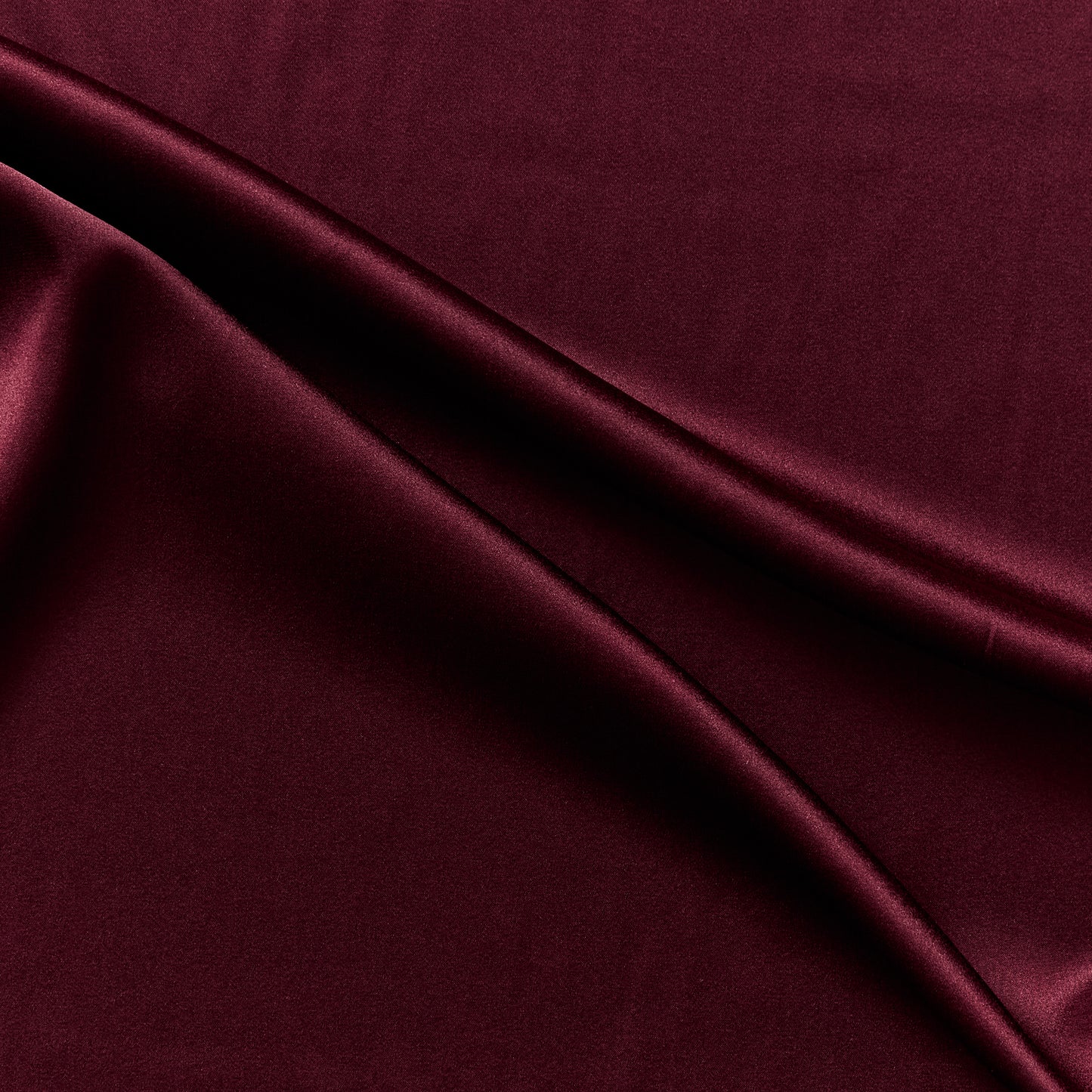 stretch silk satin featuring the ruby color version of a rich silk and lycra blend with great drape