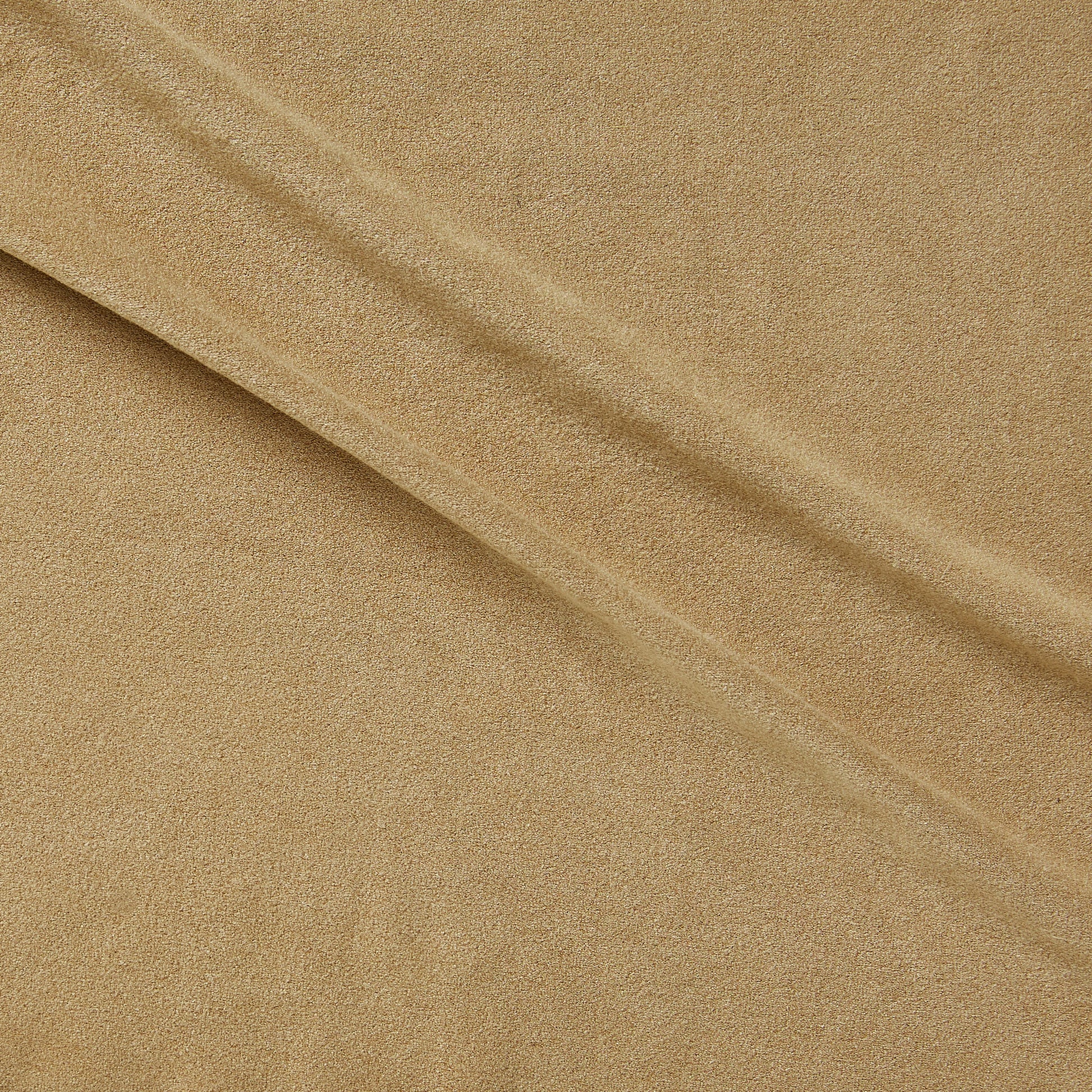 Showing super suede a chamois colored soft stretrch polyester vegan suede with spandex featuring good drape